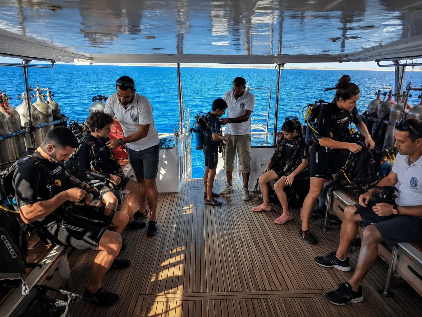 Boat Trip: Discover Scuba Diving in Hurghada, checking dive gear on the boat